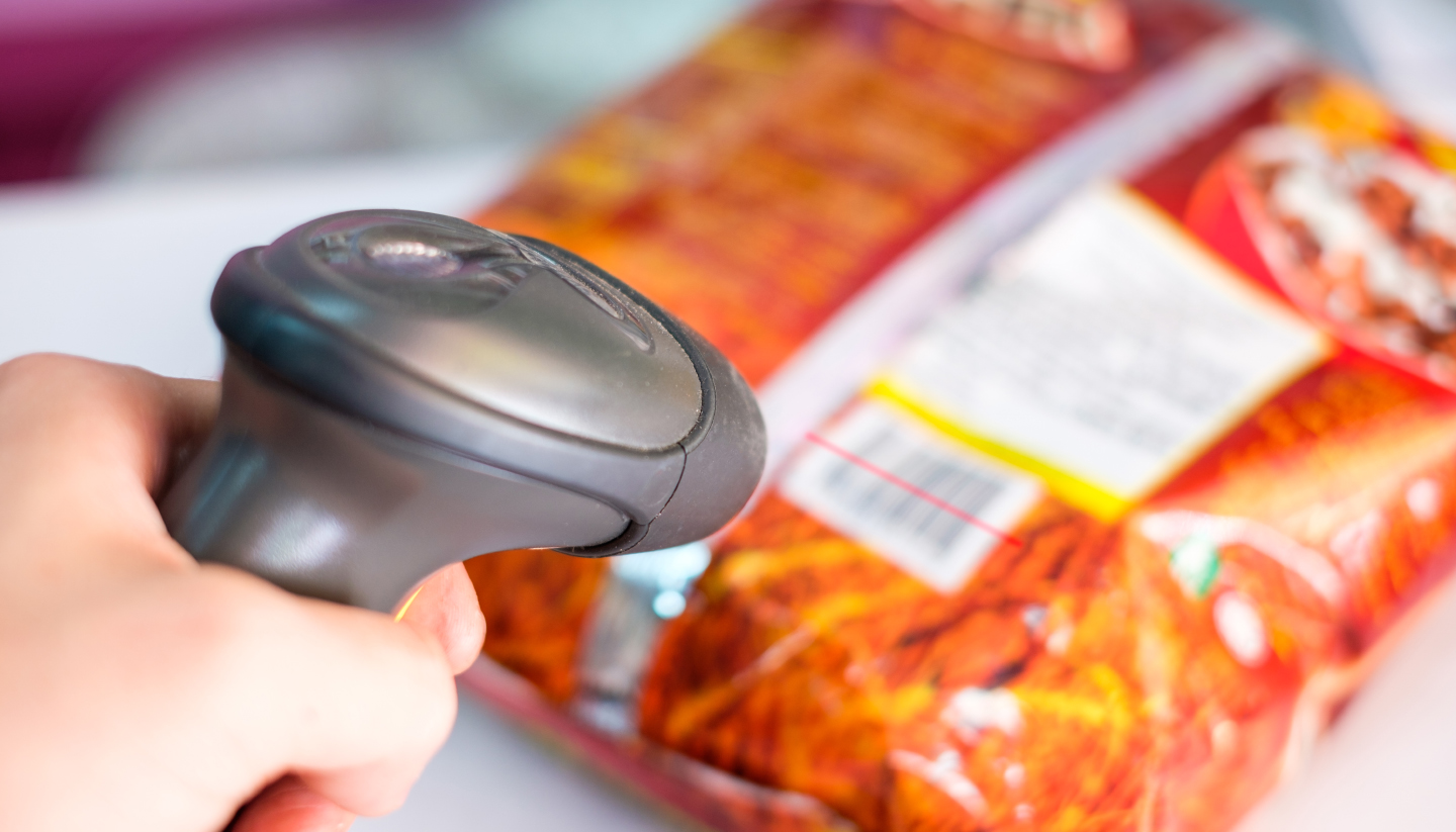 warehouse worker using bar code scanner to scanning box and analyze newly arrived goods for further placement in storage department, Working at warehouse.
